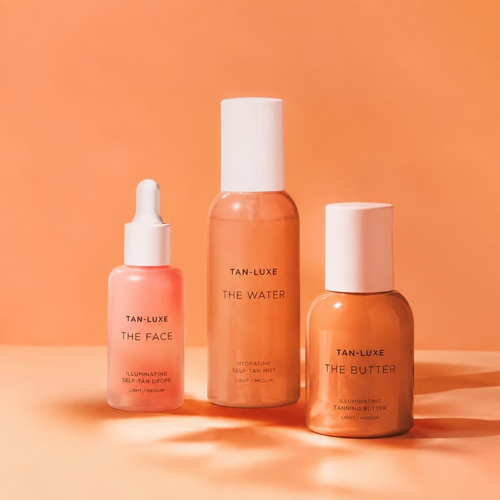 Skincare bottles photographed on a peach background
